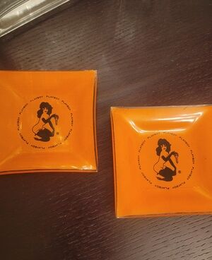 2- Vintage 1960s Playboy Club Orange Glass Ashtray / Trinket Dish